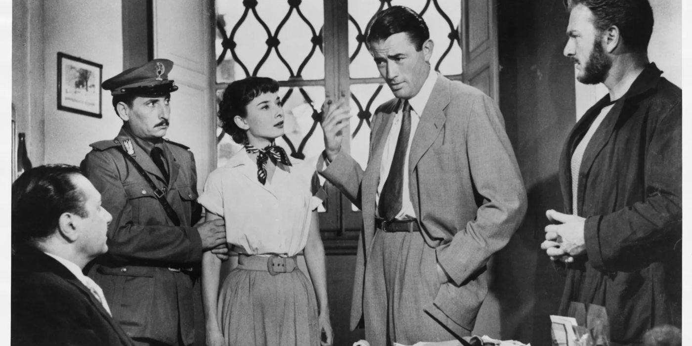 Princess Ann, played by Audrey Hepburn,? looking up at Joe Bradley, played by Gregory Peck, in Roman Holiday