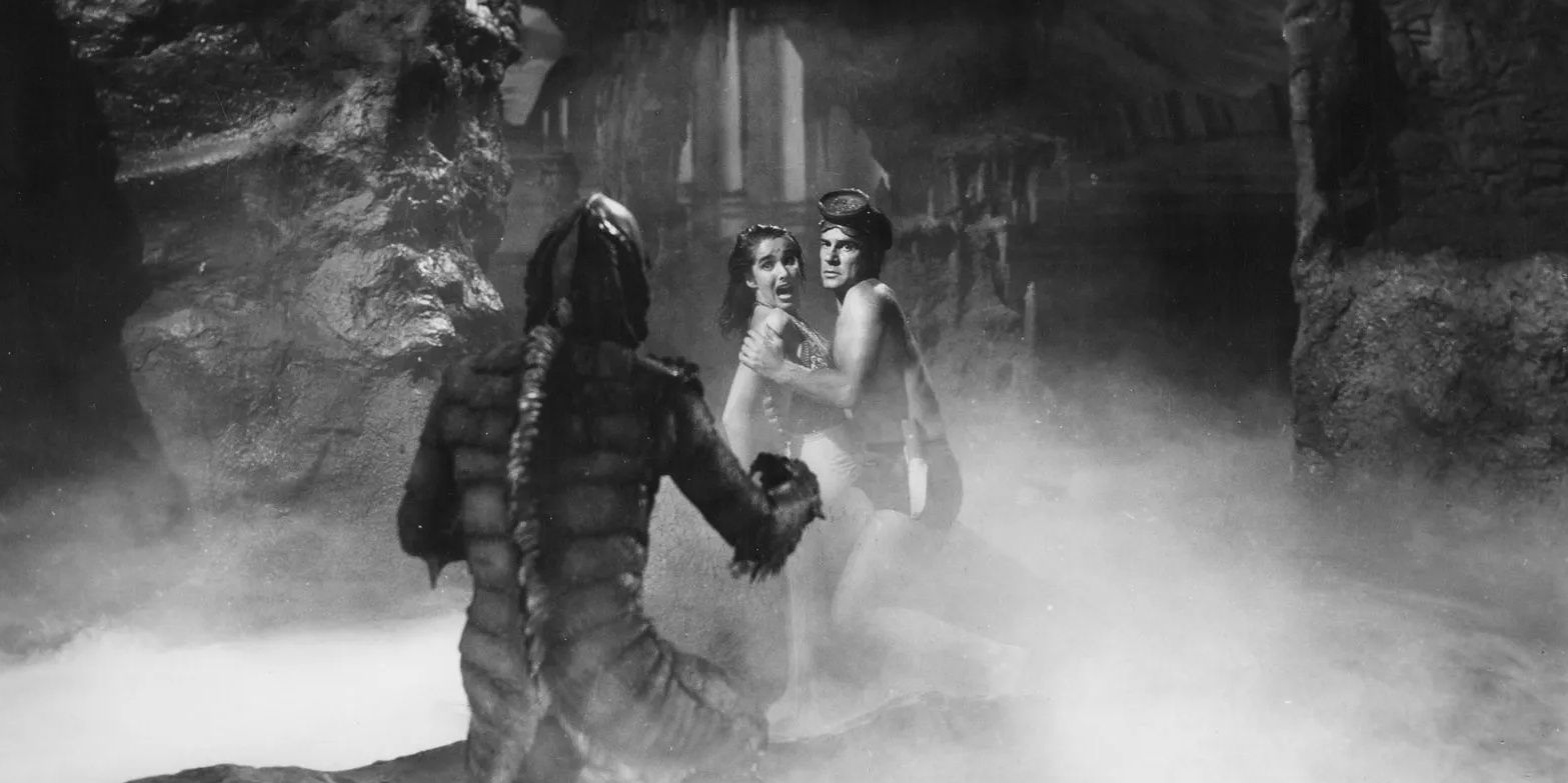 Julie Adams, as Kay, and Richard Carlson, as David, starte at the creature in Creature from the Black Lagoon