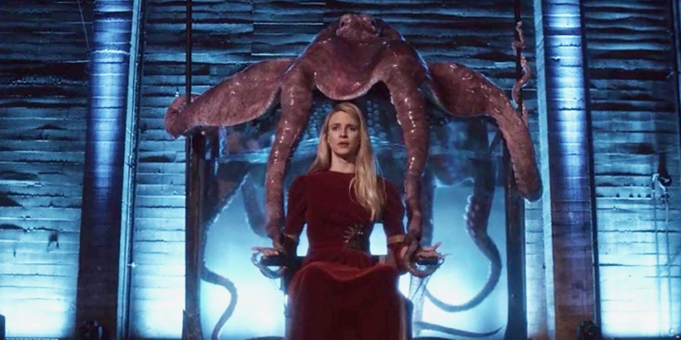 Brit Marling as Prarie Johnson sitting under a giant Octopus in 'The OA'