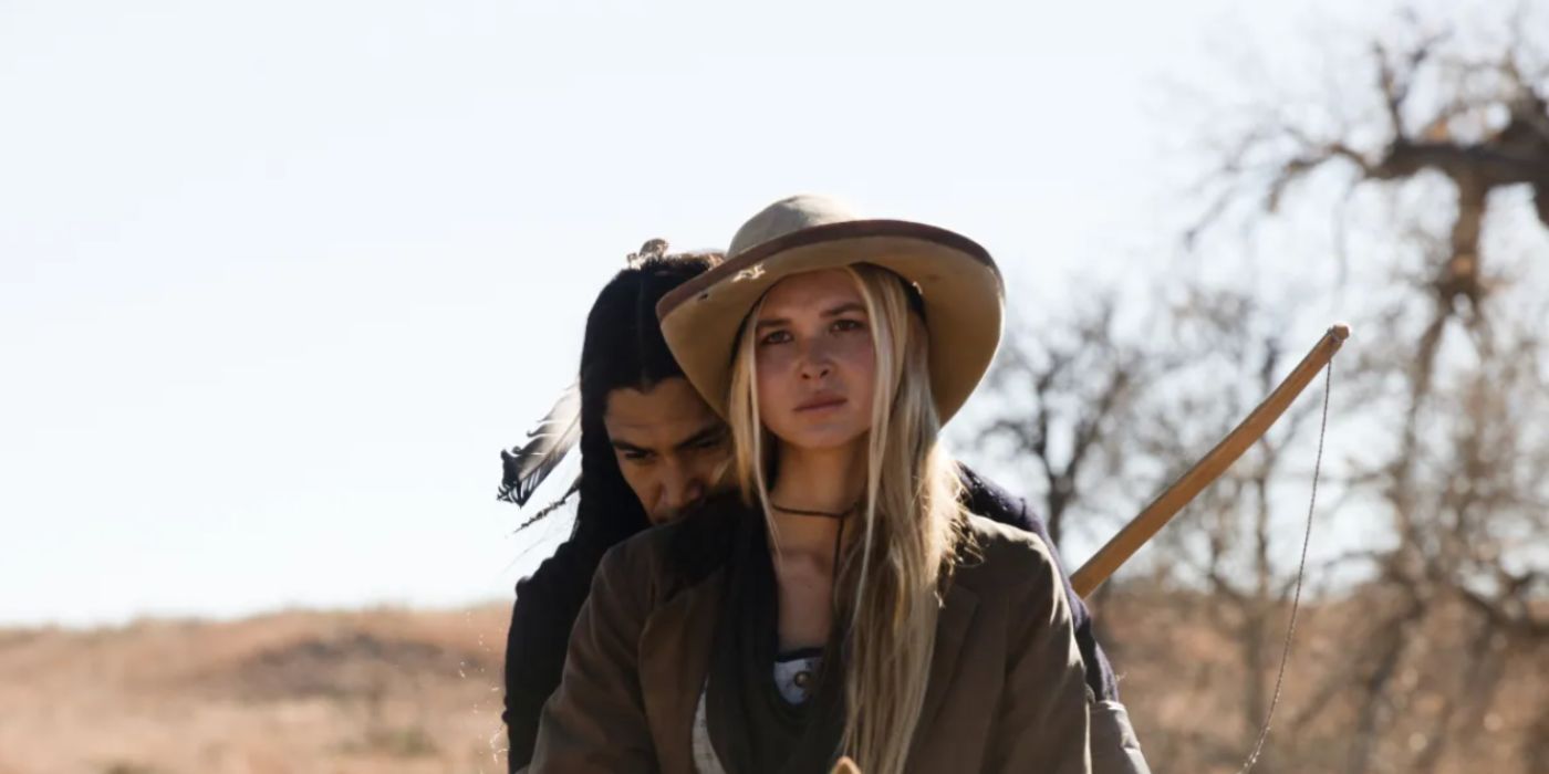 Isabel May and Martin Sensmeier as Elsa Dutton and Sam riding a horse in '1883'