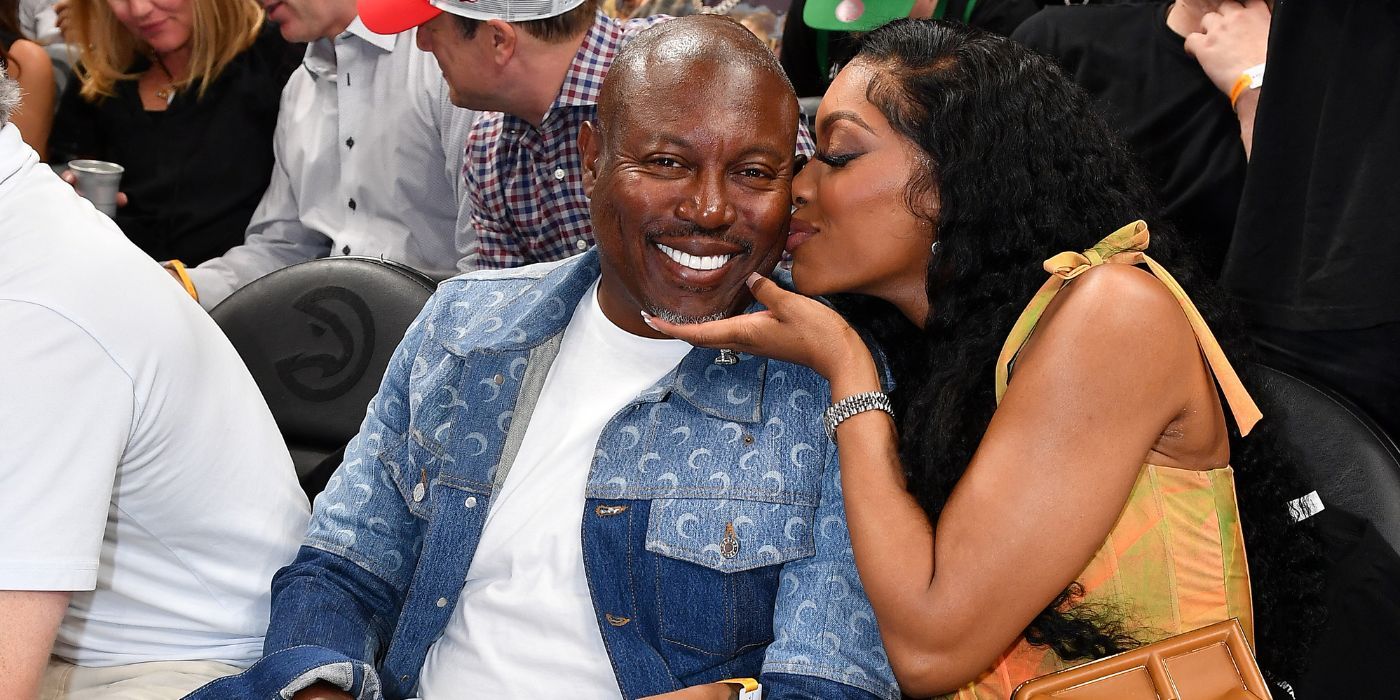 Simon and Porsha Guobadia at a basketball game