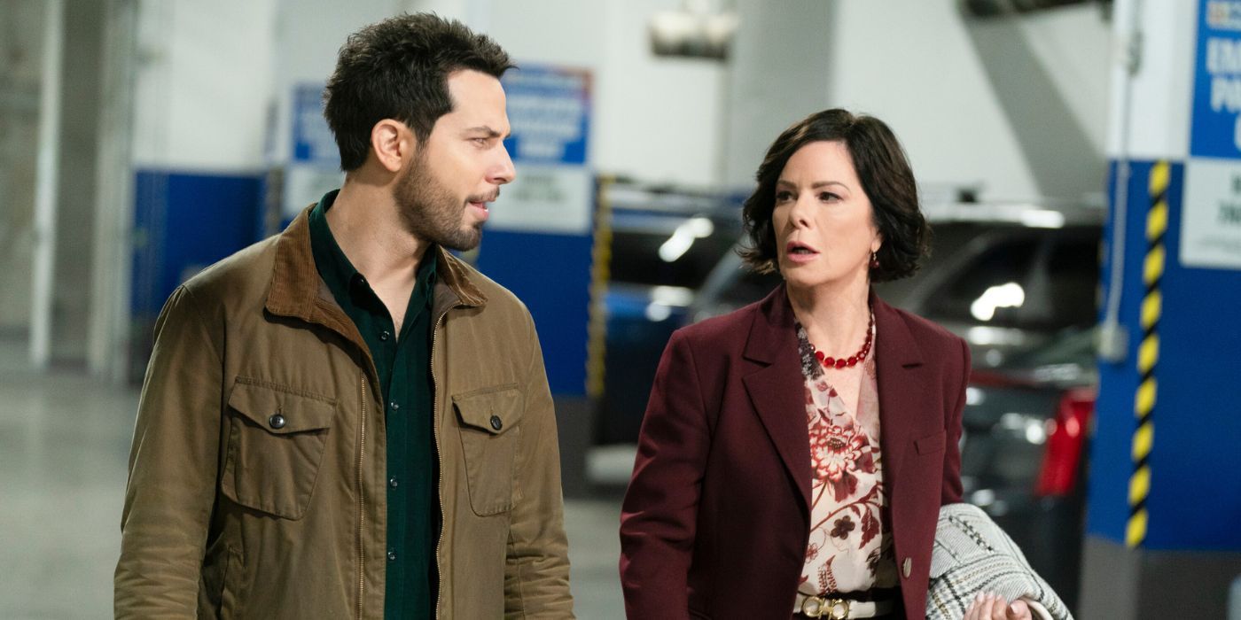 Skyler Astin and Marcia Gay Harden as Todd and Margaret, walking through a parking garage in So Help Me Todd Season 2