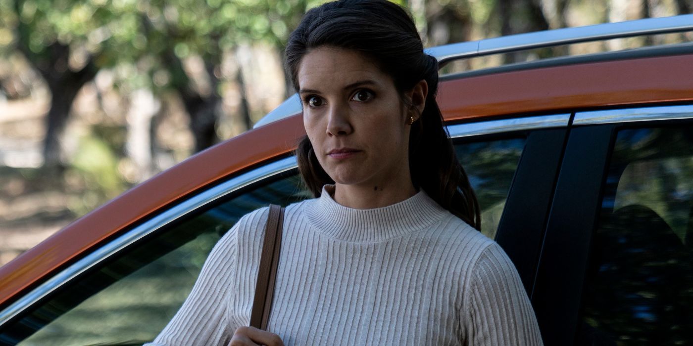 Sonya Cassidy leaning against a car in Soulmates