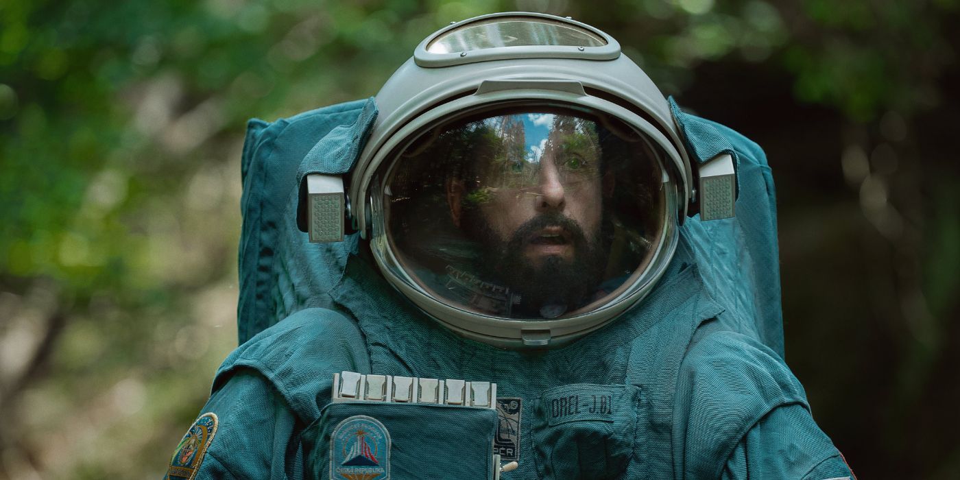 Adam Sandler as Jakub, wearing a blue spacesuit in Spaceman.