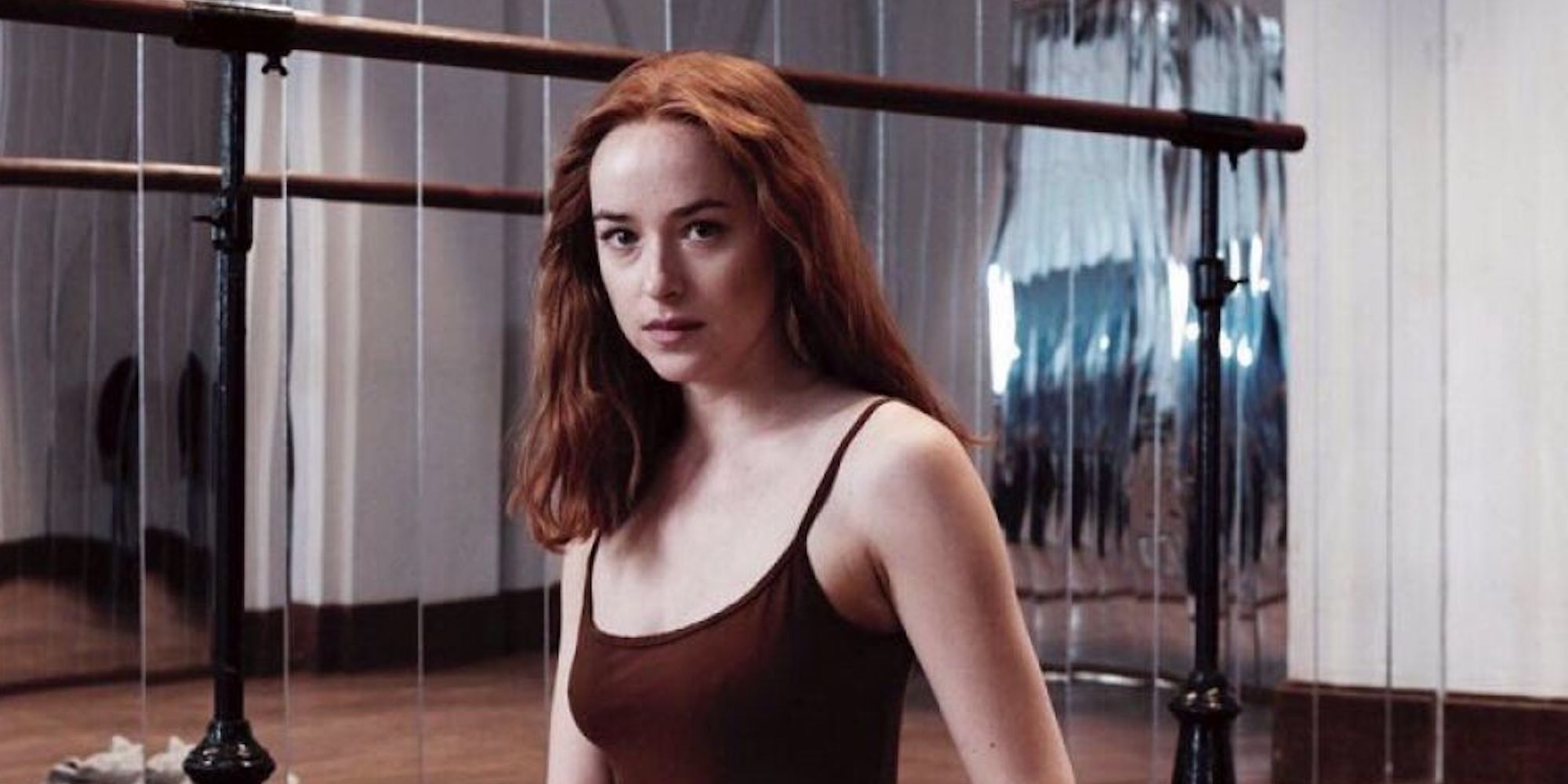 Dakota Johnson as Susie looking intently in Suspiria