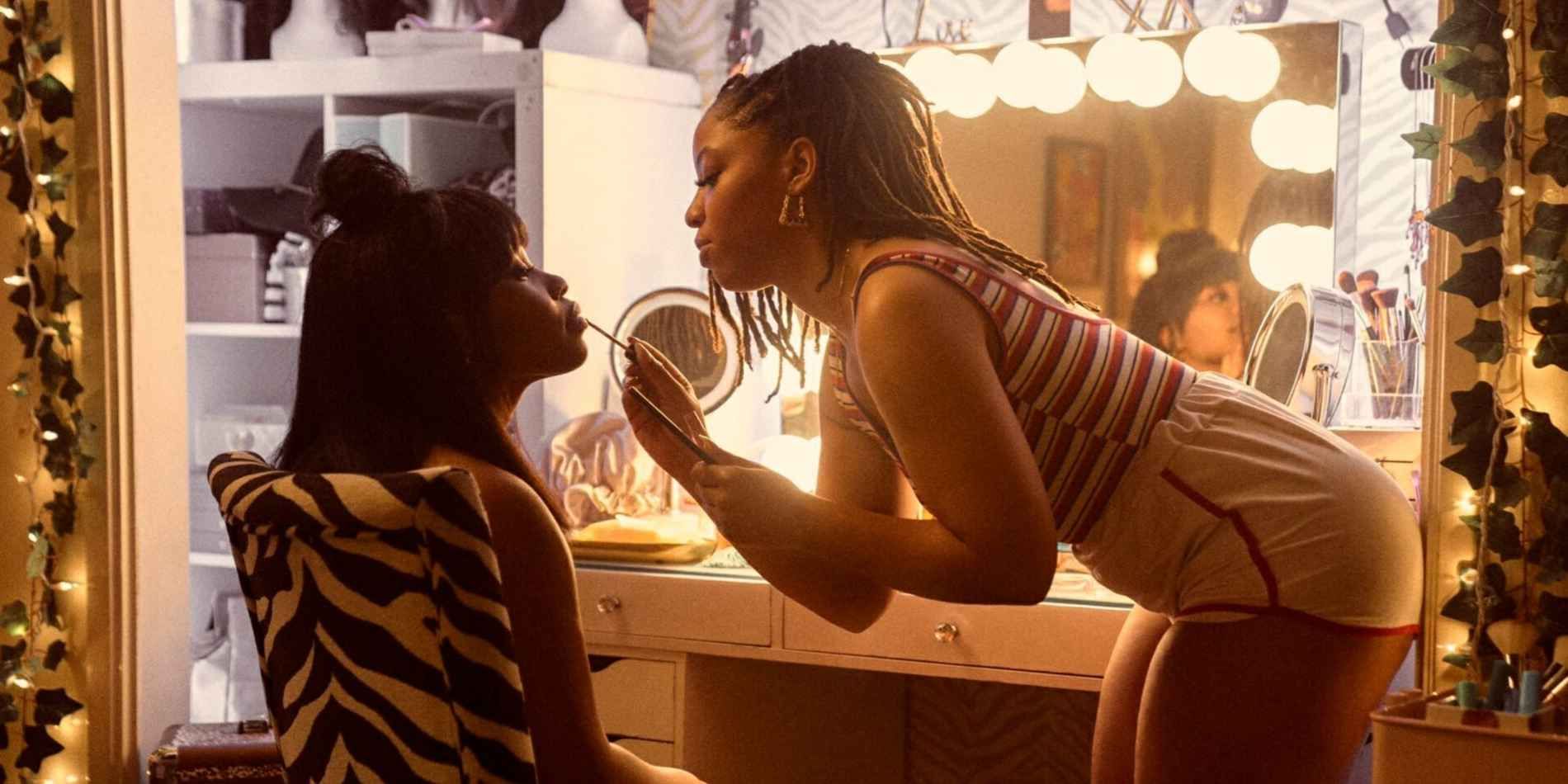 Chloe Bailey applies lipstick to Dominique Fishback in 'Swarm'