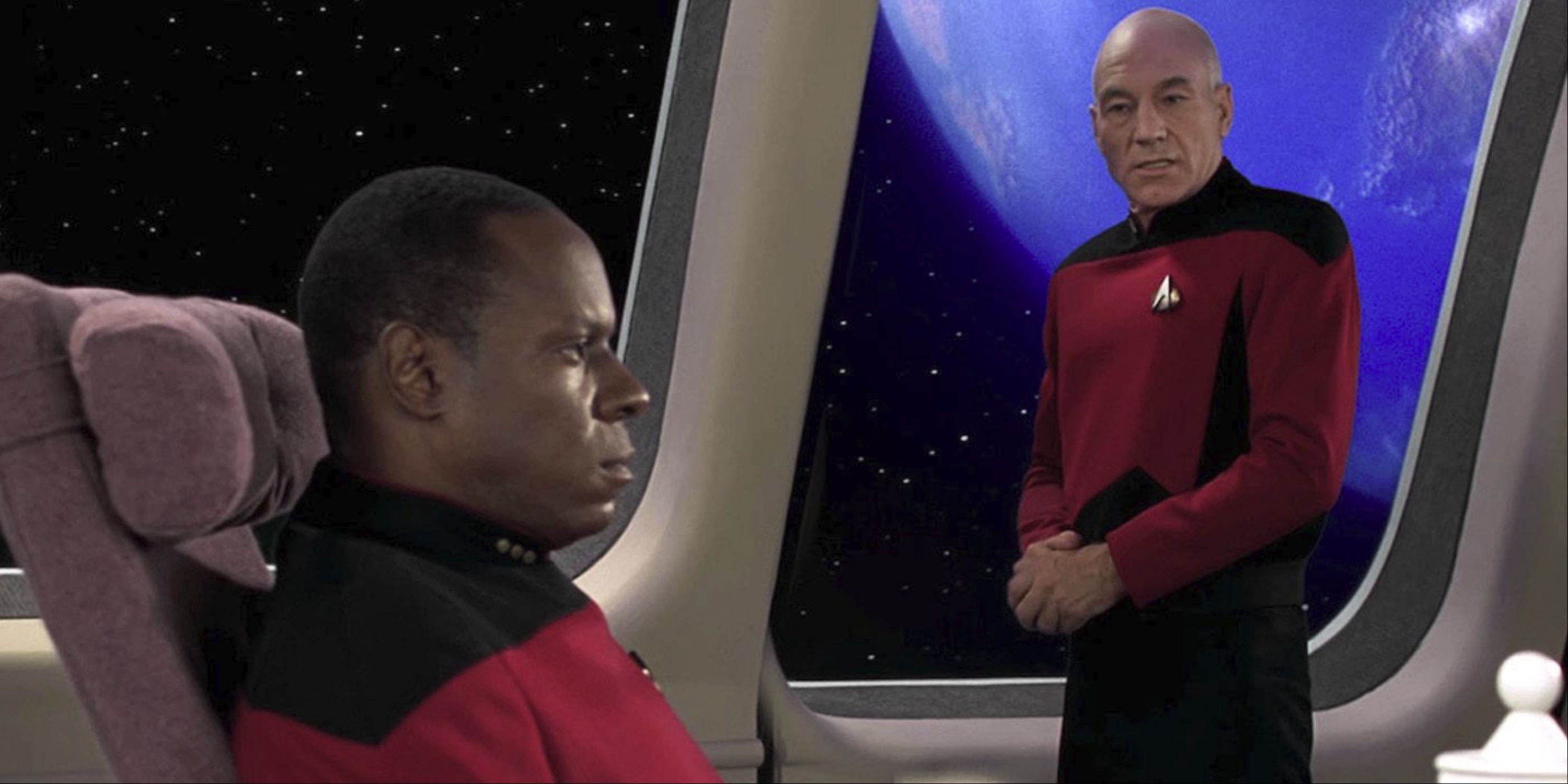 Jean-Luc Picard and Michael Dorn talking in Star Trek: The Next Generation