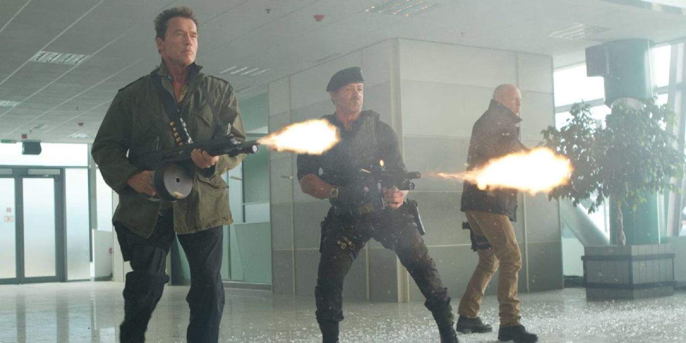 Two men fighting with flame throwers in The Expendables 2