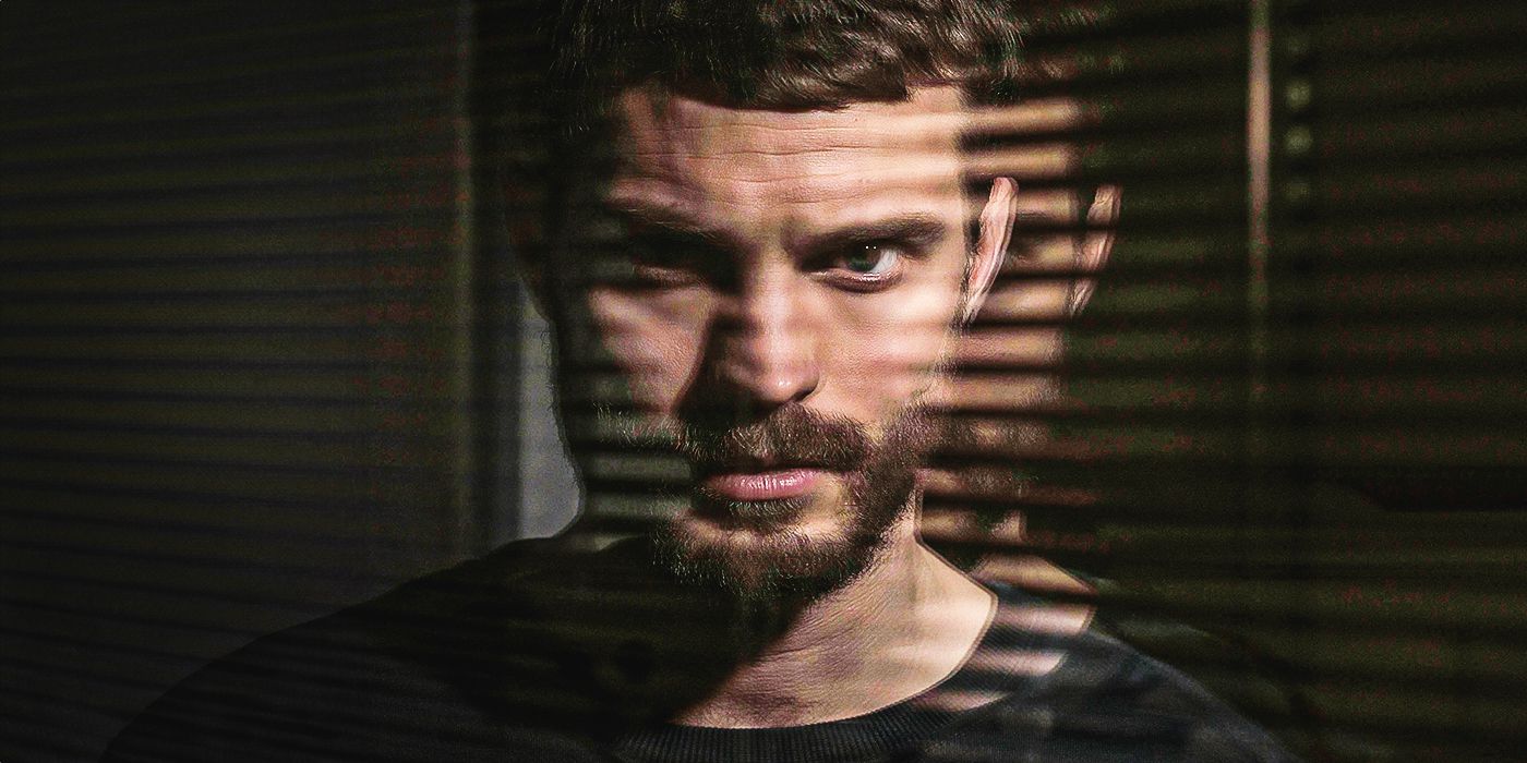 A publicity still of Jamie Dornan in The Fall, staring straight into the camera with a double effect behind him and shadows cast by window blinds over his face