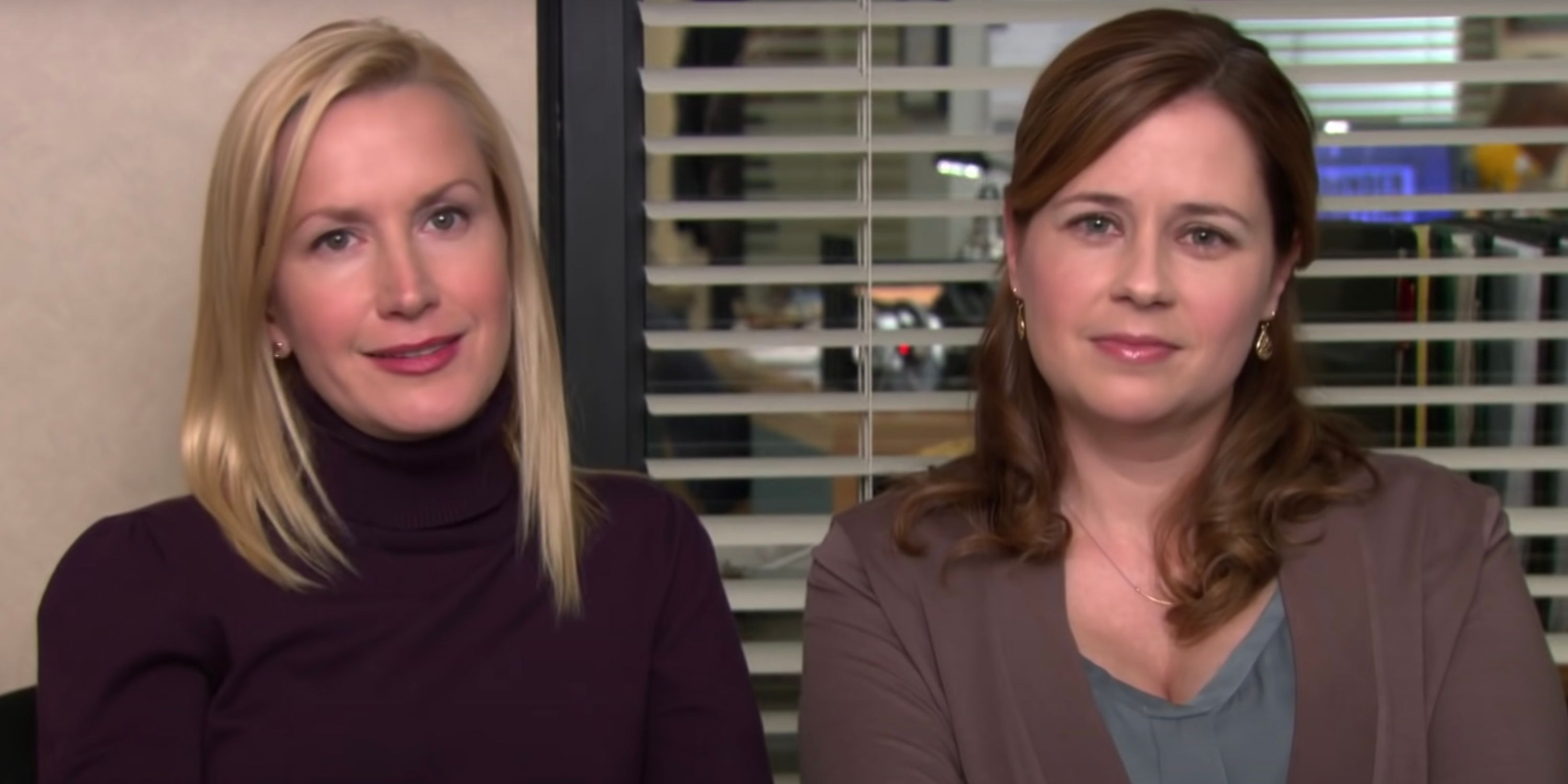  Pam (Jenna Fischer) and Angela (Angela Kinsey) sitting together looking at camera in The Office