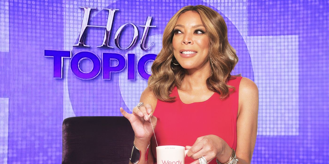 Wendy Williams sits and smiles from her infamous Hot Topics chair with a cup of tea
