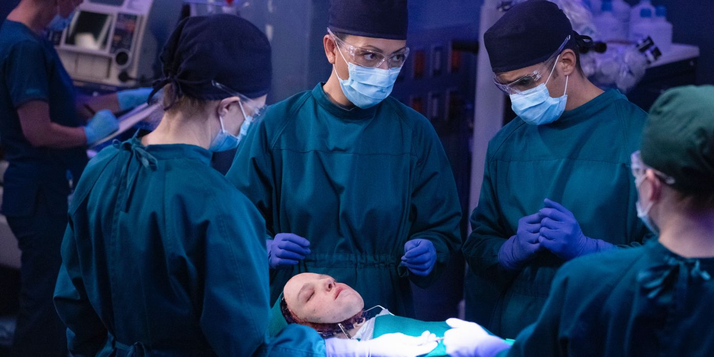 The cast of 'The Good Doctor' wear scrubs during a surgery.