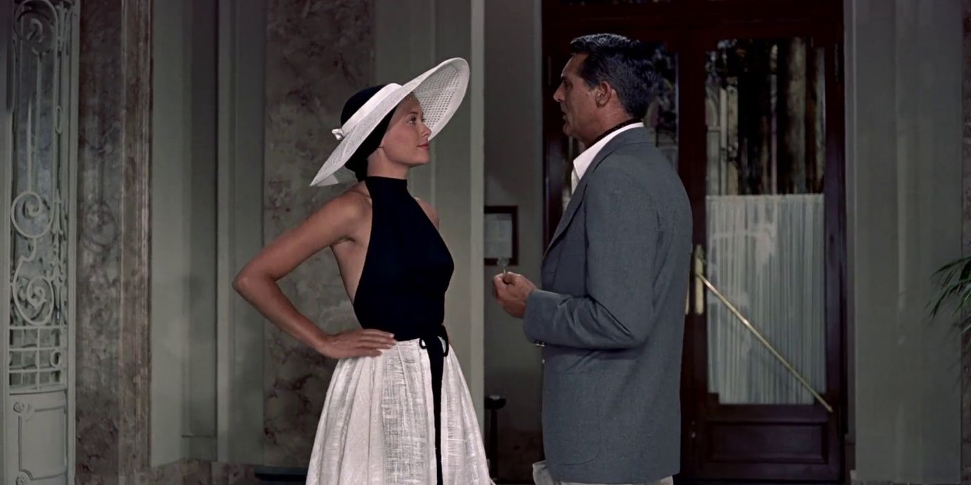 Frances, played by Grace Kelly, and John, played by Cary Grant, standing and facing one another, in To Catch a Thief
