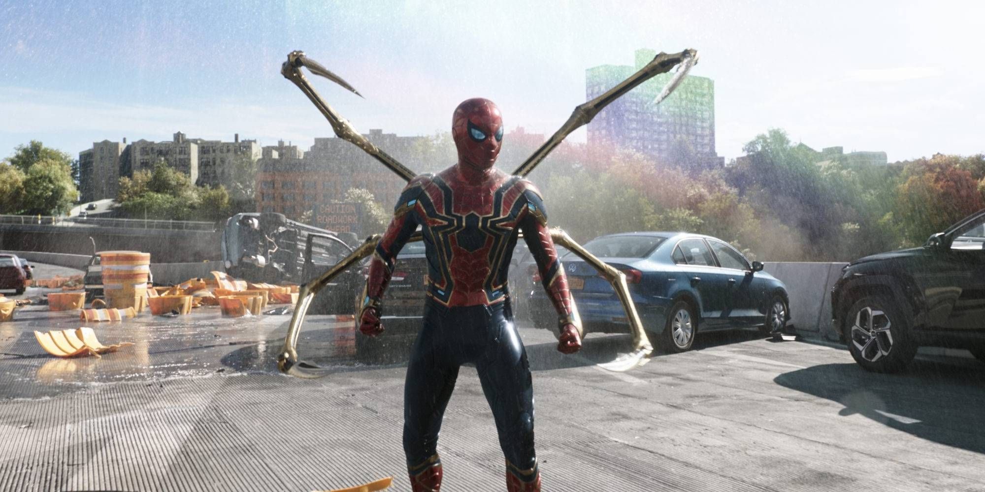 Spider-Man wearing the Iron Spider suit while standing on a bridge in Spider-Man: No Way Home