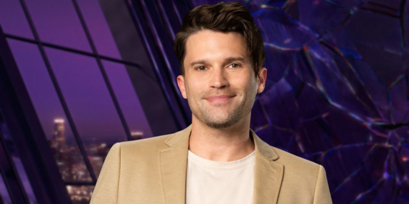 Tom Schwartz smiles in a white shirt and brown jacket for season 11 of 