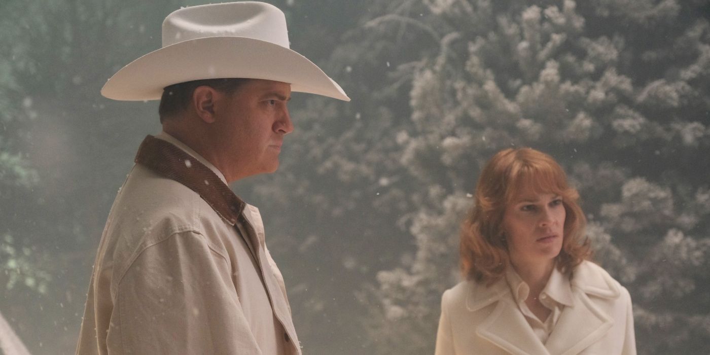 Brendan Fraser and Hilary Swank as James Fletcher Chace and Gail Getty, looking angrily at someone while standing in the snow in Trust