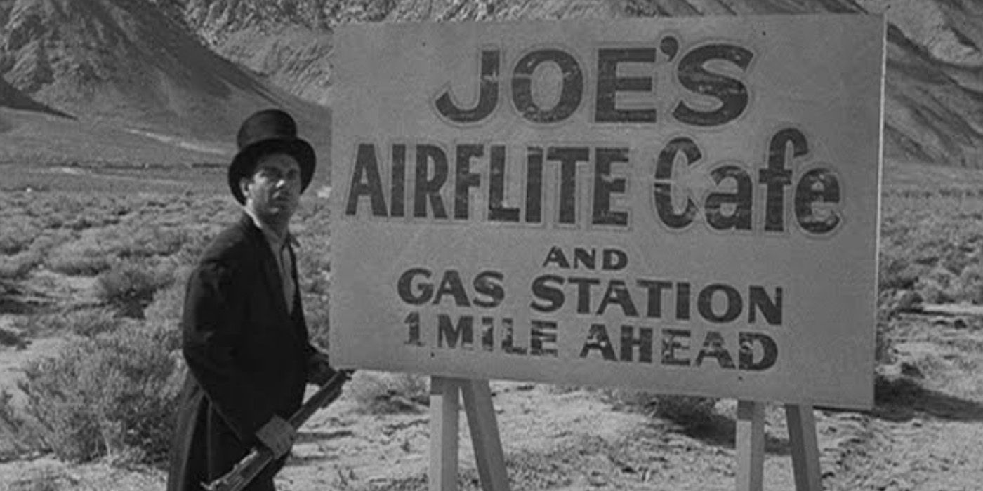 Chris Horn (Cliff Robertson) looks at a sign in &lsquo;The Twilight Zone&rsquo; episode &ldquo;A Hundred Yards Over the Rim&rdquo;
