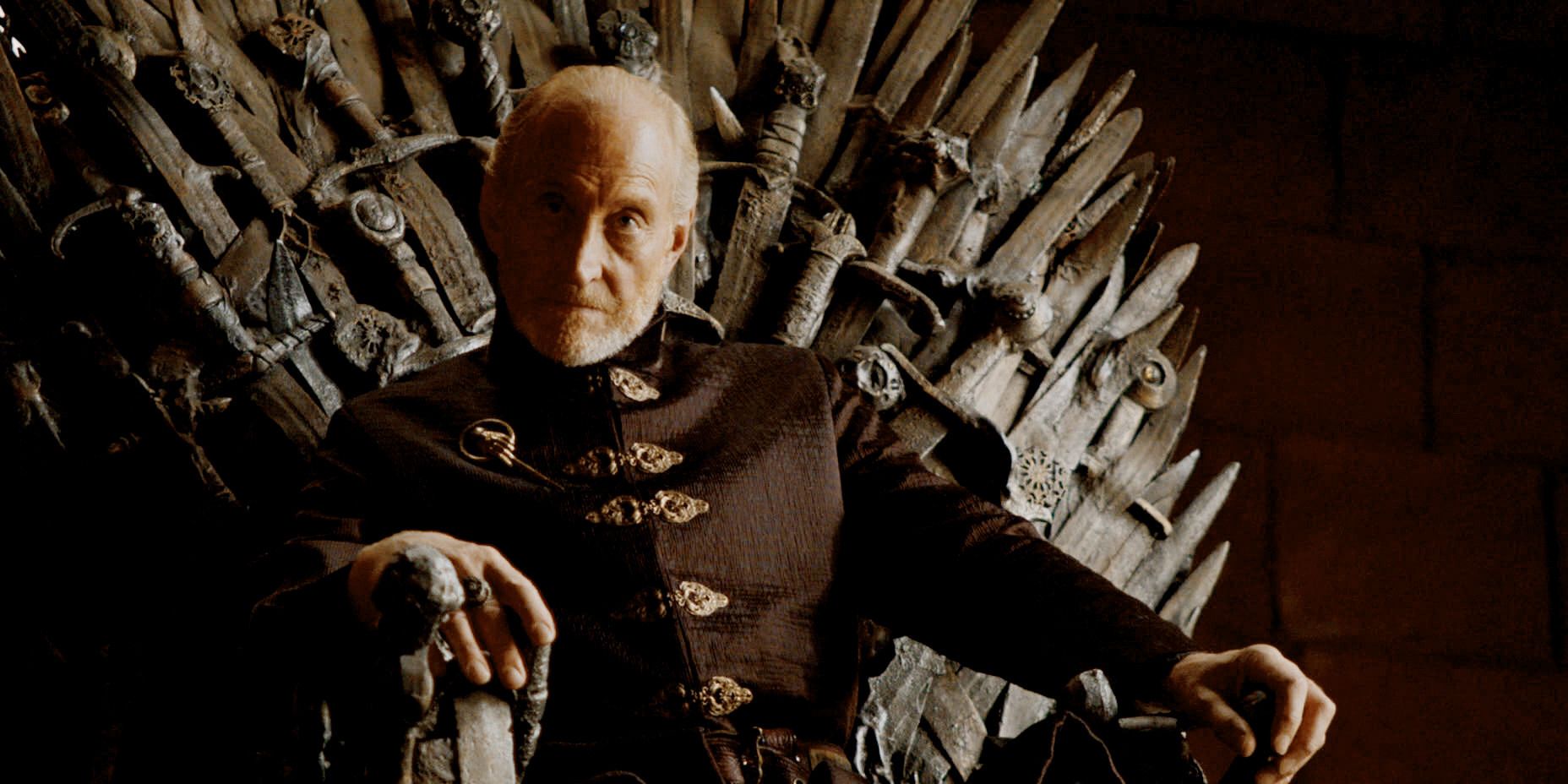 Tywin Lannister sits on the Iron Throne as Hand of the King in Game of Thrones Season 4