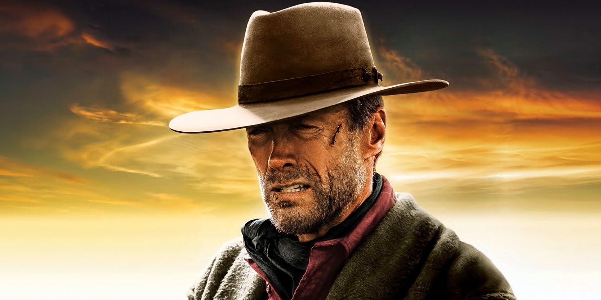 A close-up of Clint Eastwood wearing a cowboy hat, looking disgruntled in the 1992 Unforgiven poster