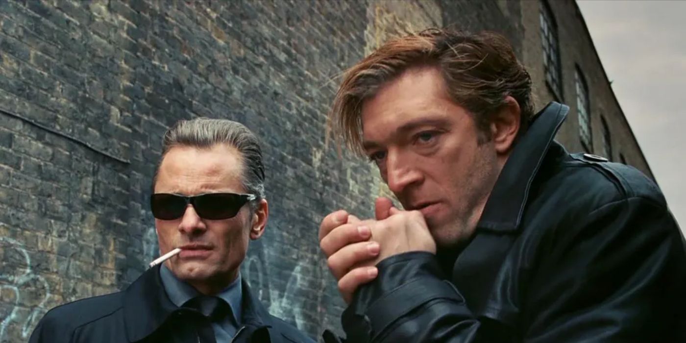 Viggo Mortensen and Vincent Cassel side by side looking down at something off-camera in 'Eastern Promises'