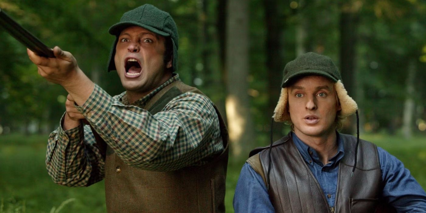 Vince Vaughn screaming with a gun and Owen Wilson looking concerned in Wedding Crashers