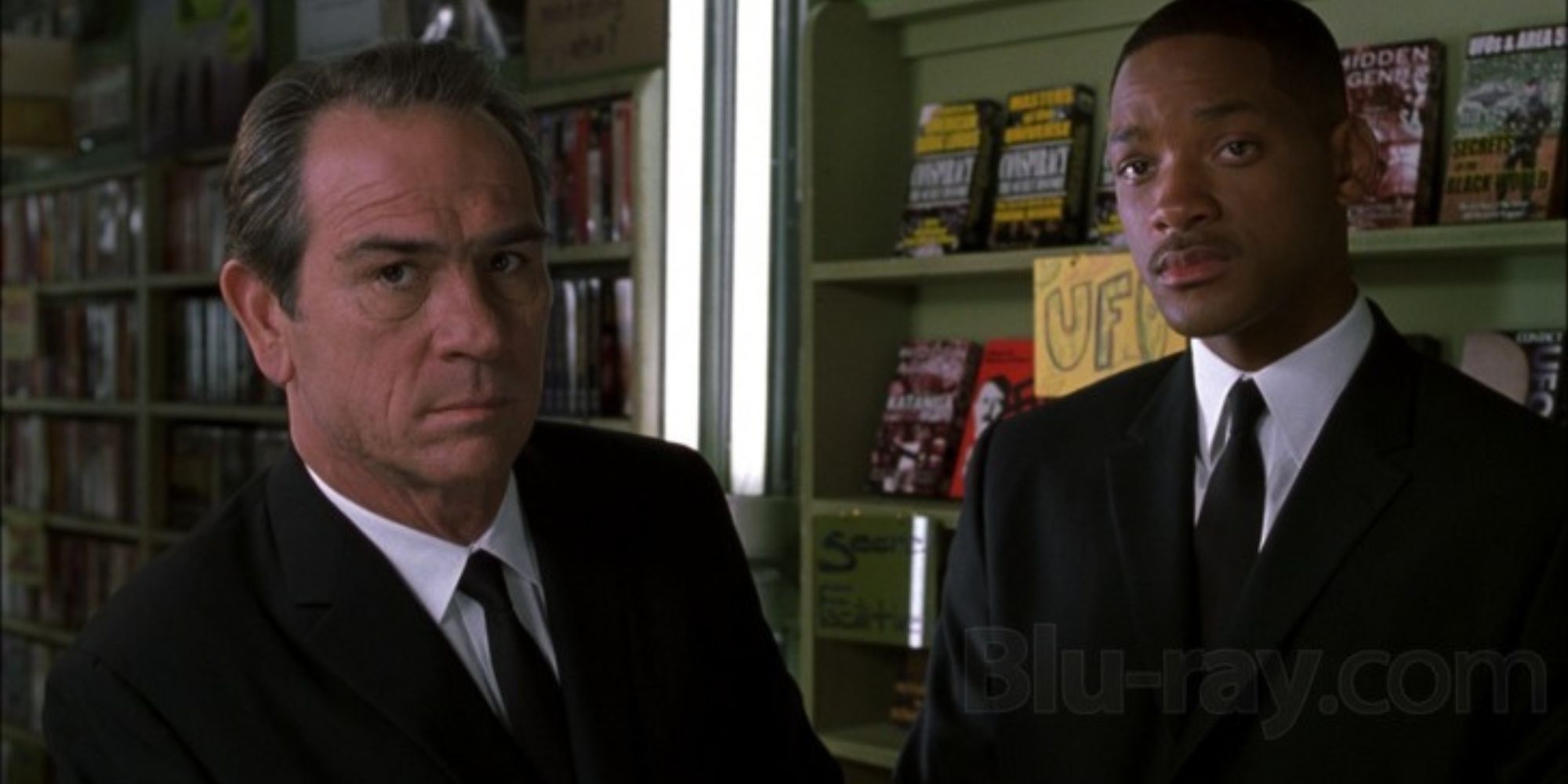 Agents K and J looking in intently ahead in Men in Black II (2002)