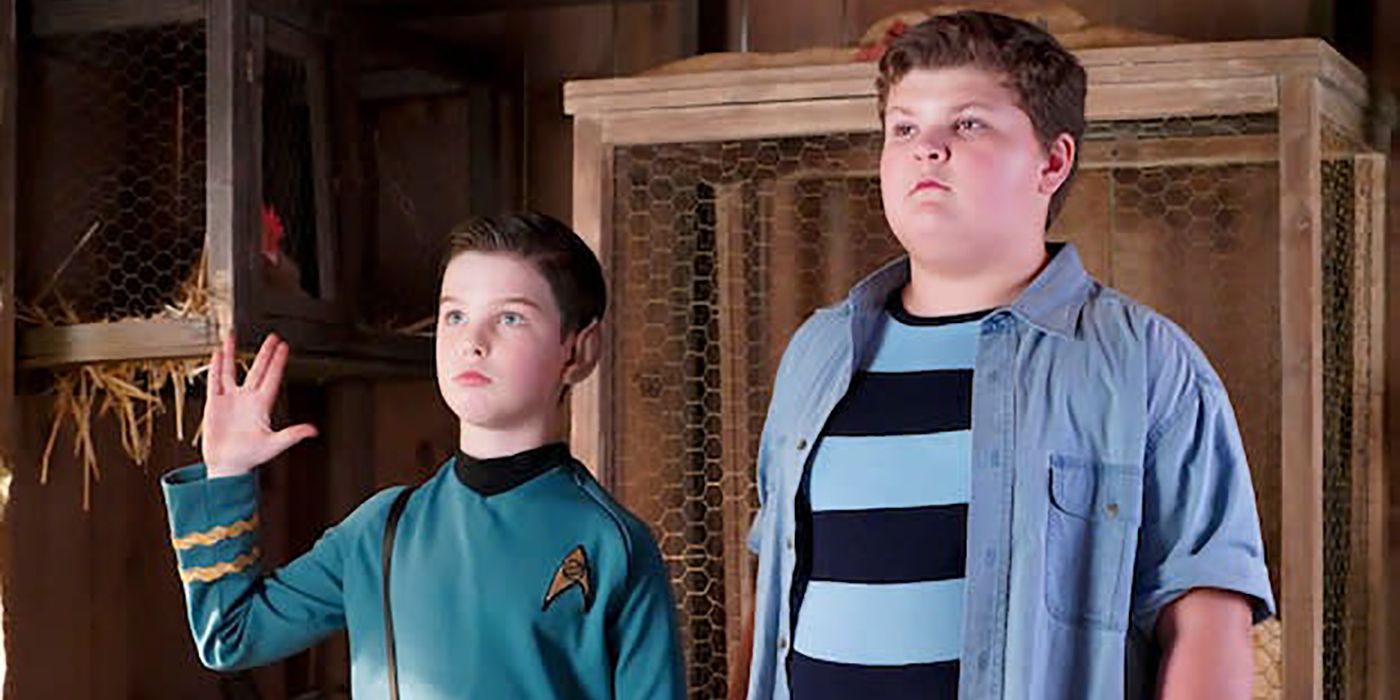 Sheldon in a Star Trek costume doing the hand signal beside Billy Sparks in Young Sheldon.