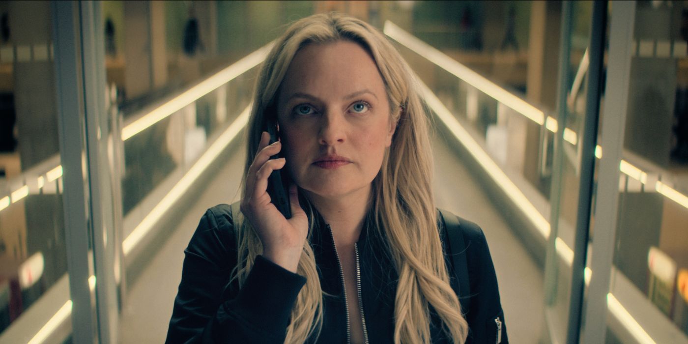 Elisabeth Moss on her phone in The Veil.