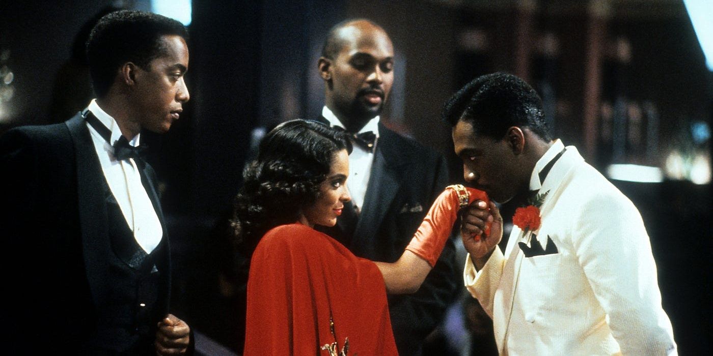  Eddie Murphy formally greeting Jasmine Guy in Harlem Nights