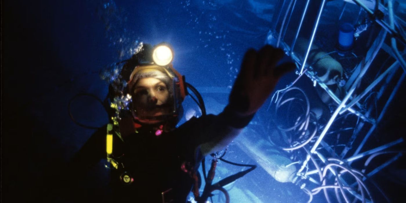 A diver reaches out in James Cameron's The Abyss