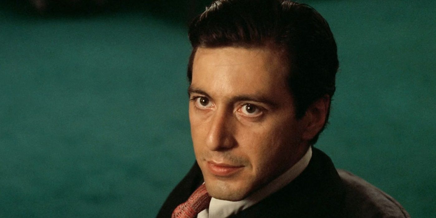 Al Pacino as Michael Corleone sitting in a chair, looking up in The Godfather Part II