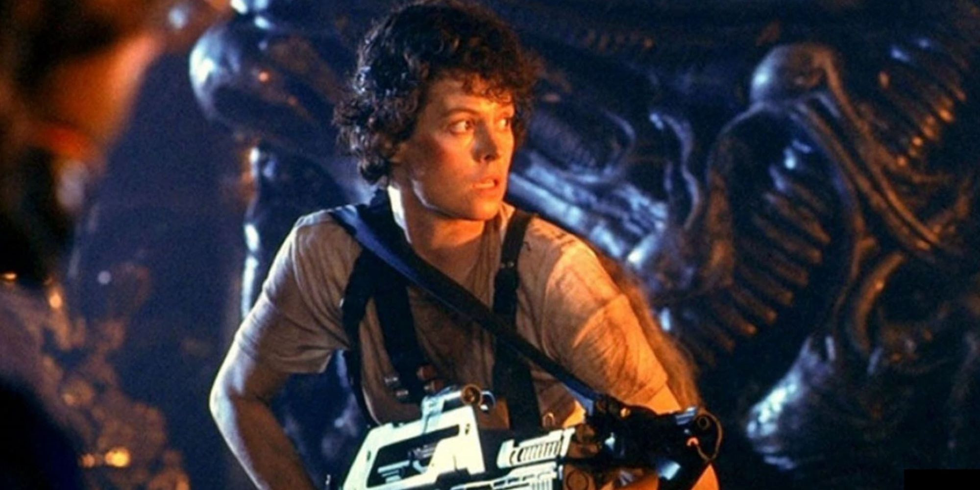 Sigourney Weaver as Ellen Ripley looking at an object offscreen in 'Aliens'