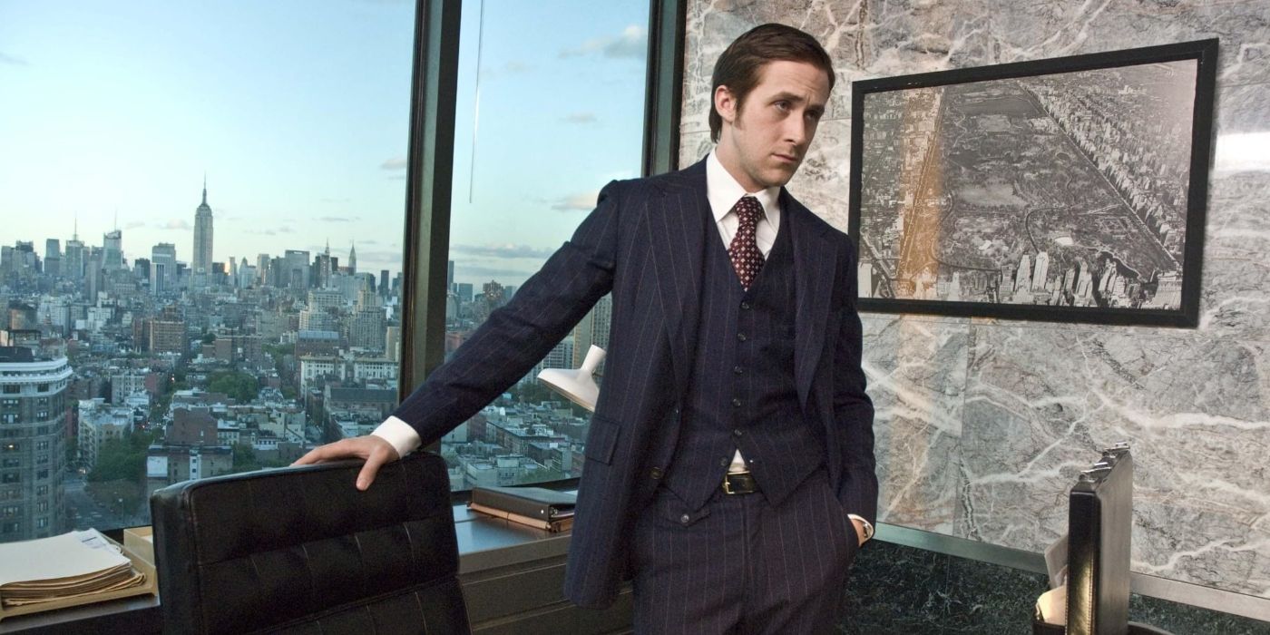 Ryan Gosling as David Marks, standing glumly by a desk in an office overlooking the city in All Good Things