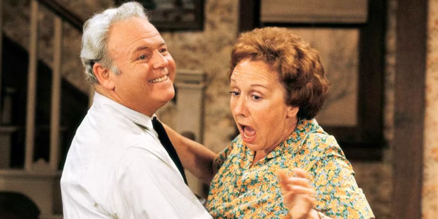 Archie and Edith Bunker embracing in All in the Family