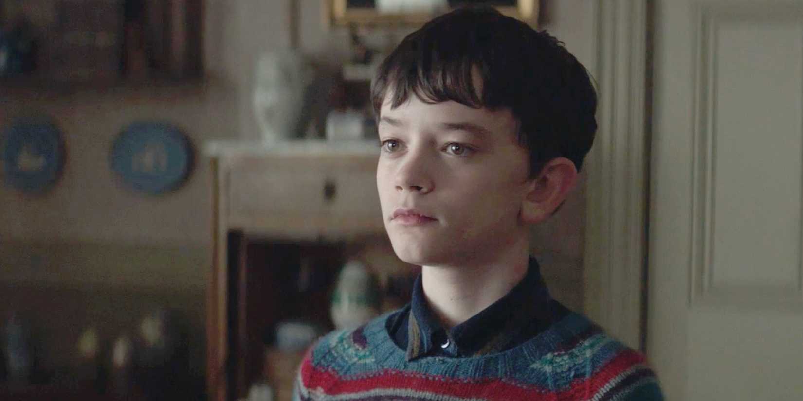 Conor looking surprised in A Monster Calls