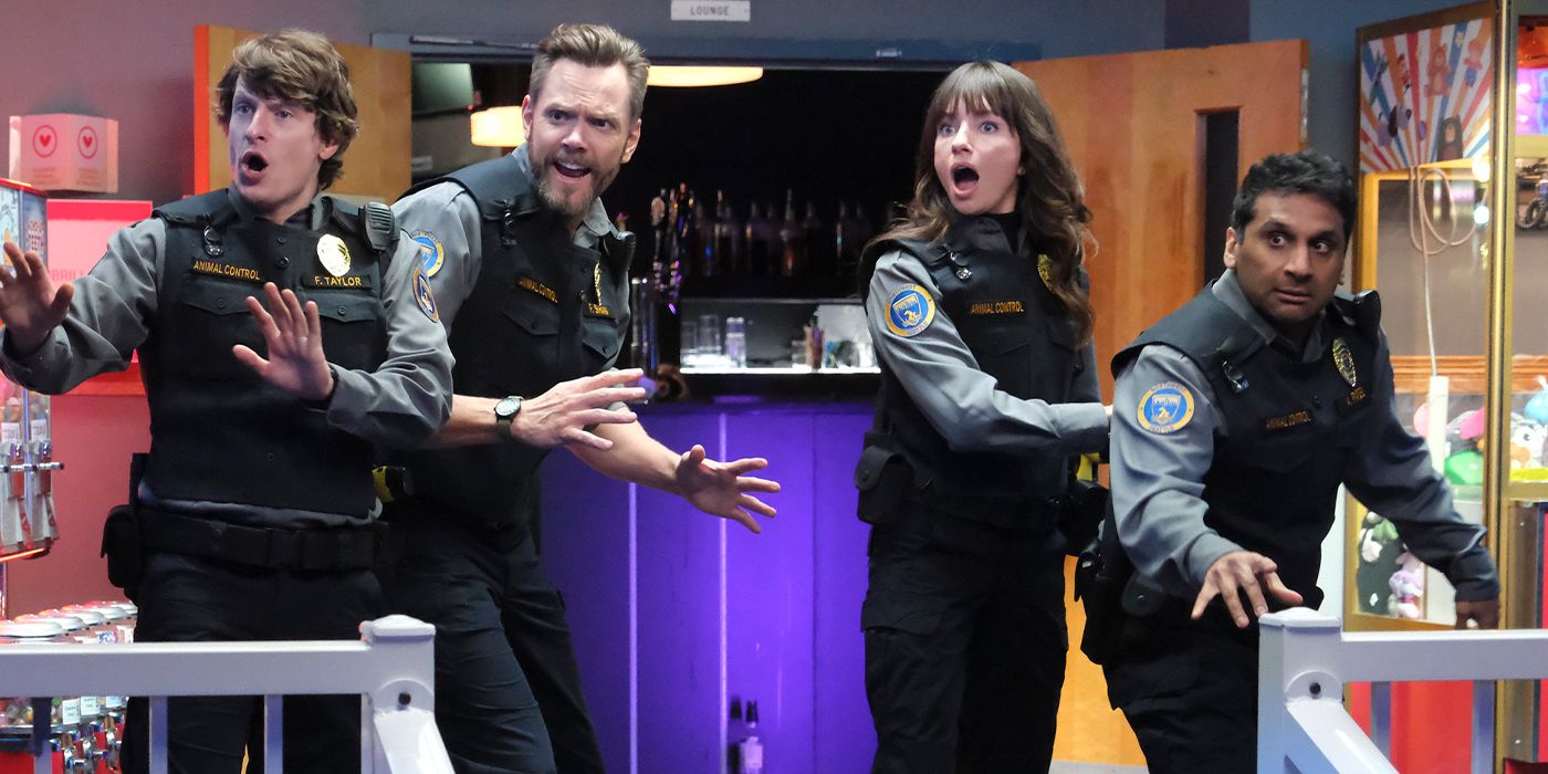 Animal control officers led by Joel McHale look in awe at something off-screen in Animal Control Season 2.