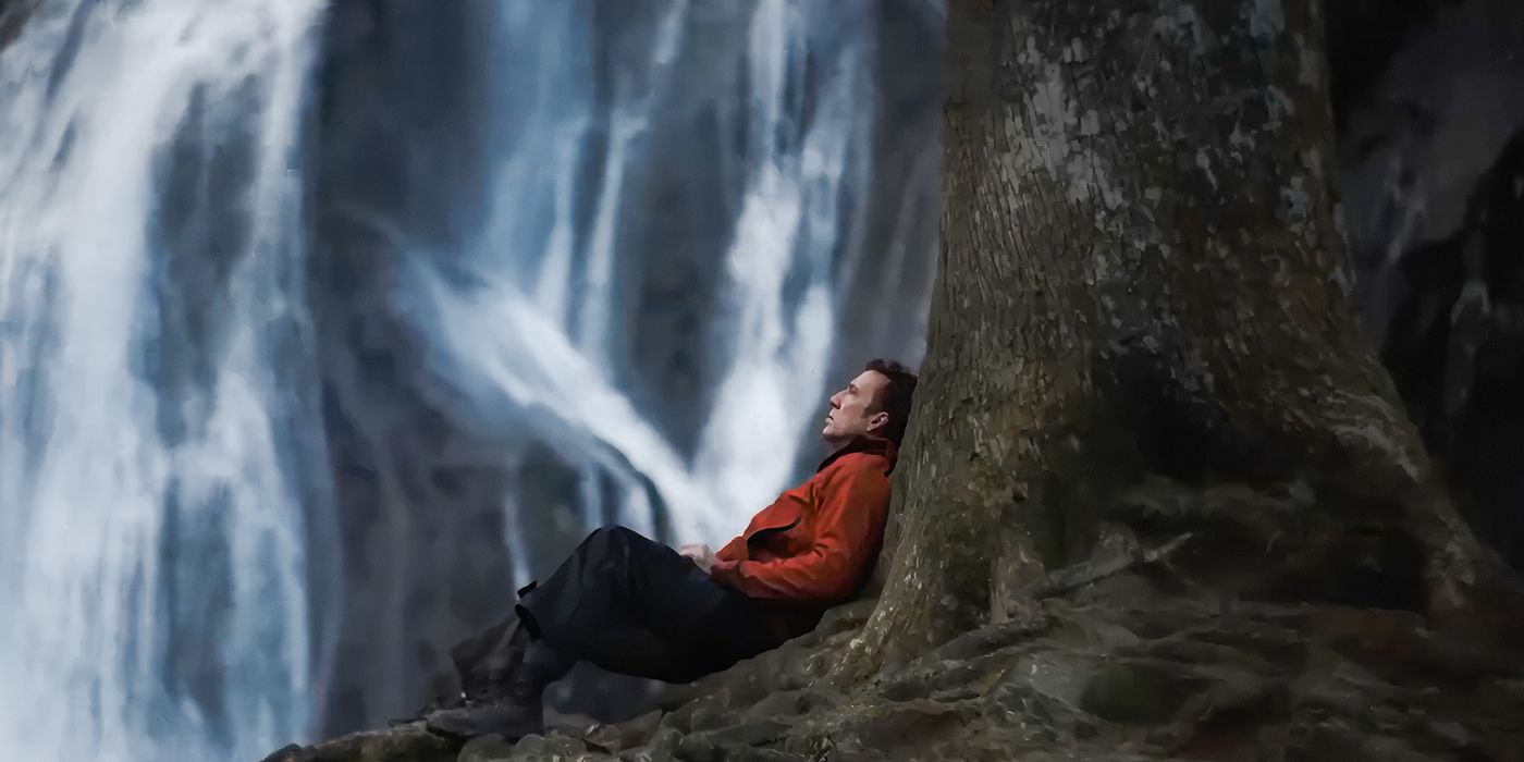 Nicolas Cage leads up again a tree with a waterfall as the backdrop for his loneliness in Arcadian