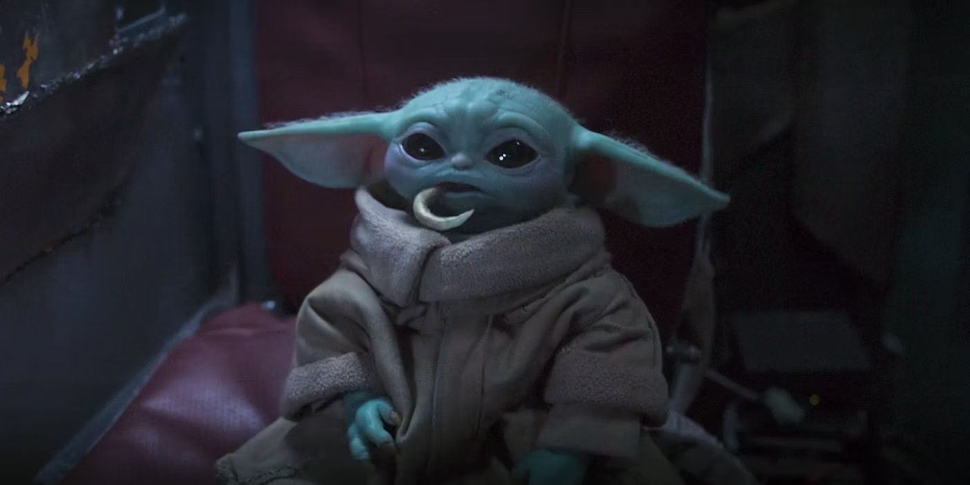 Grogu with food hanging out of his mouth in The Mandalorian