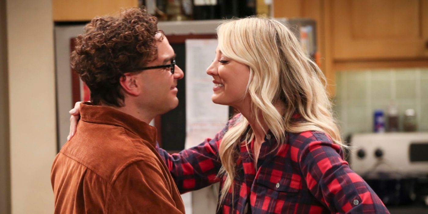 Penny (Kaley Cuoco) smiling and leaning in to kiss Leonard (Johnny Galecki) in the series finale of The Big Bang Theory