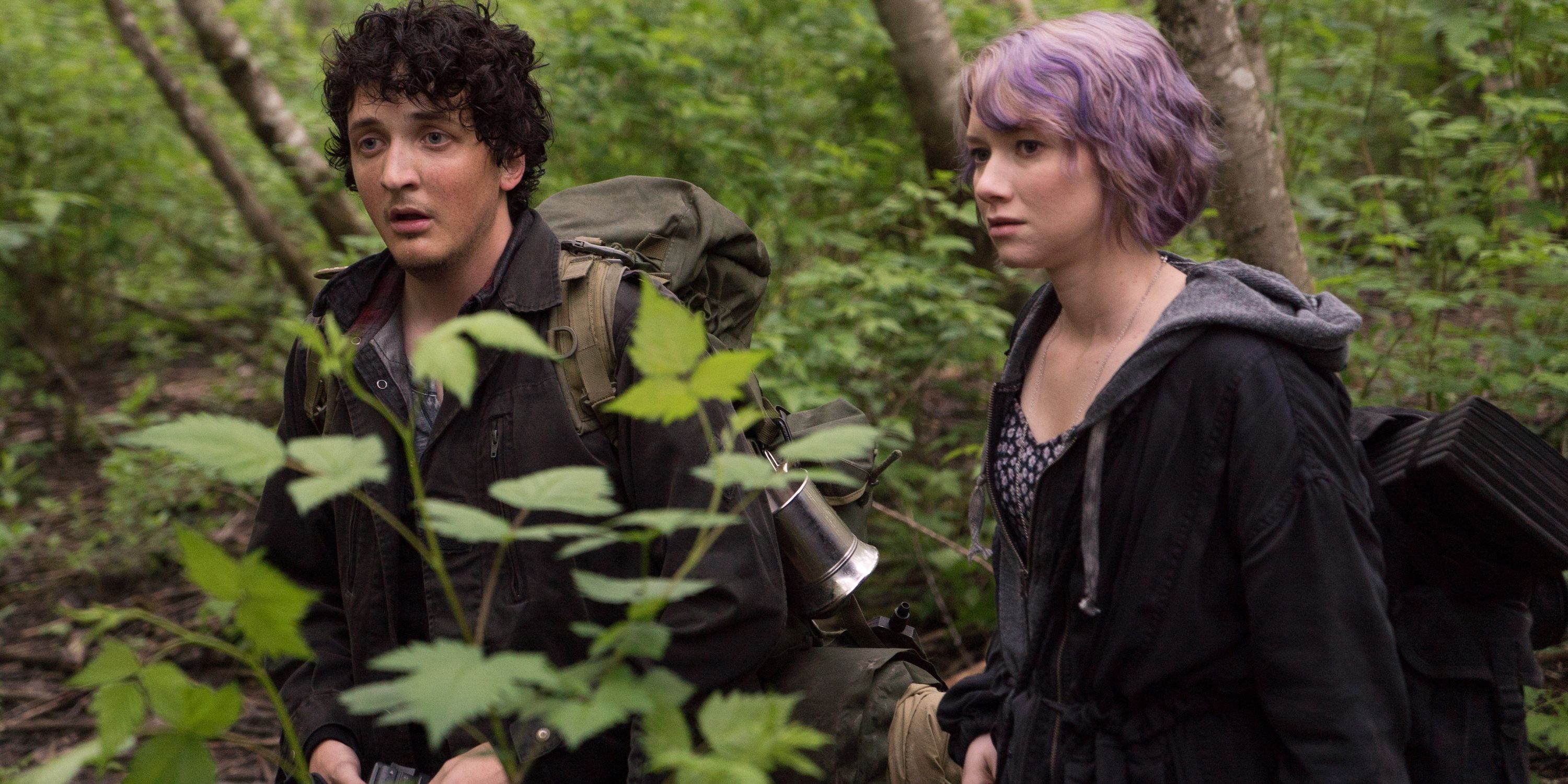 Valorie Curry as Talia and Wes Robinson as Lane in the forest in Blair Witch 2016