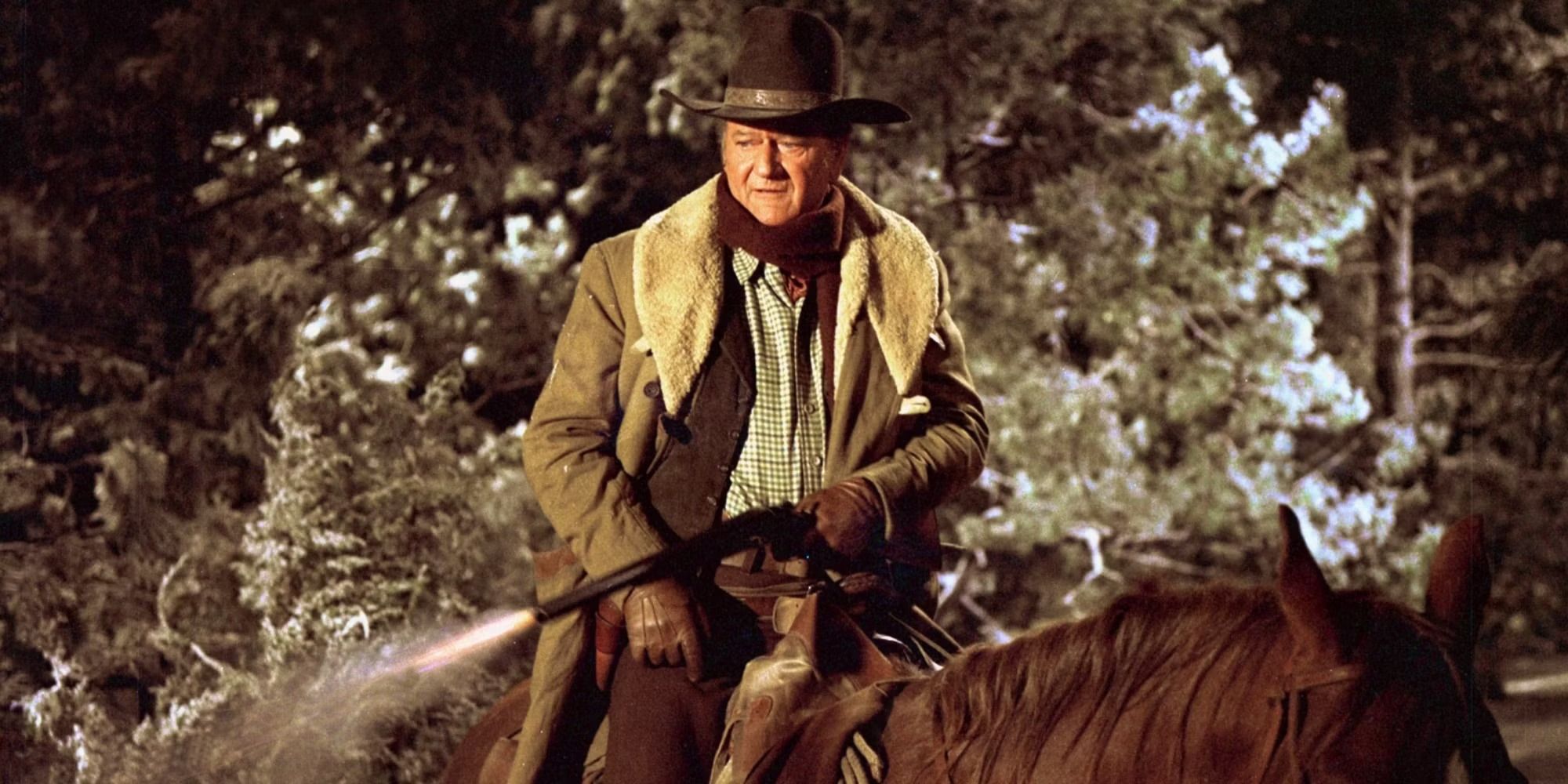 John Wayne riding a horse in Cahill US Marshal