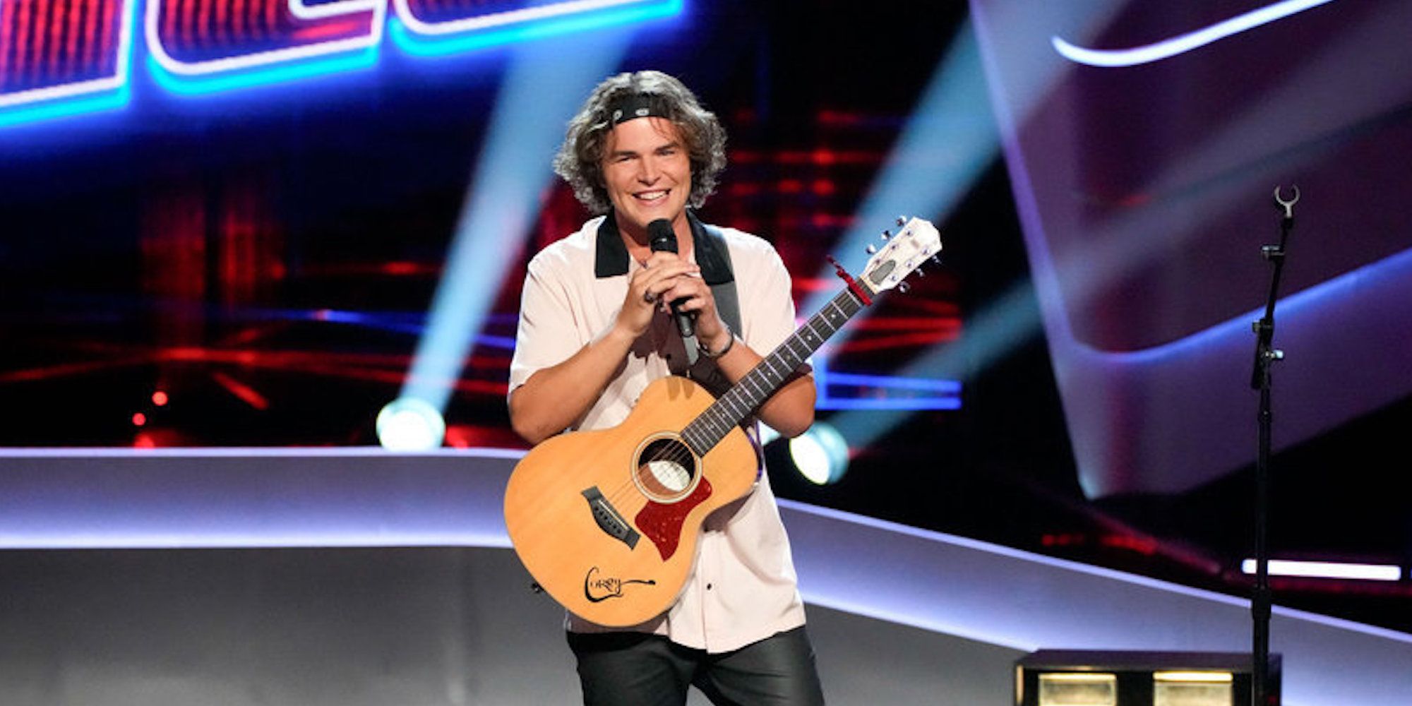 Corey Curtis auditions for 'The Voice' accompanied by an acoustic guitar