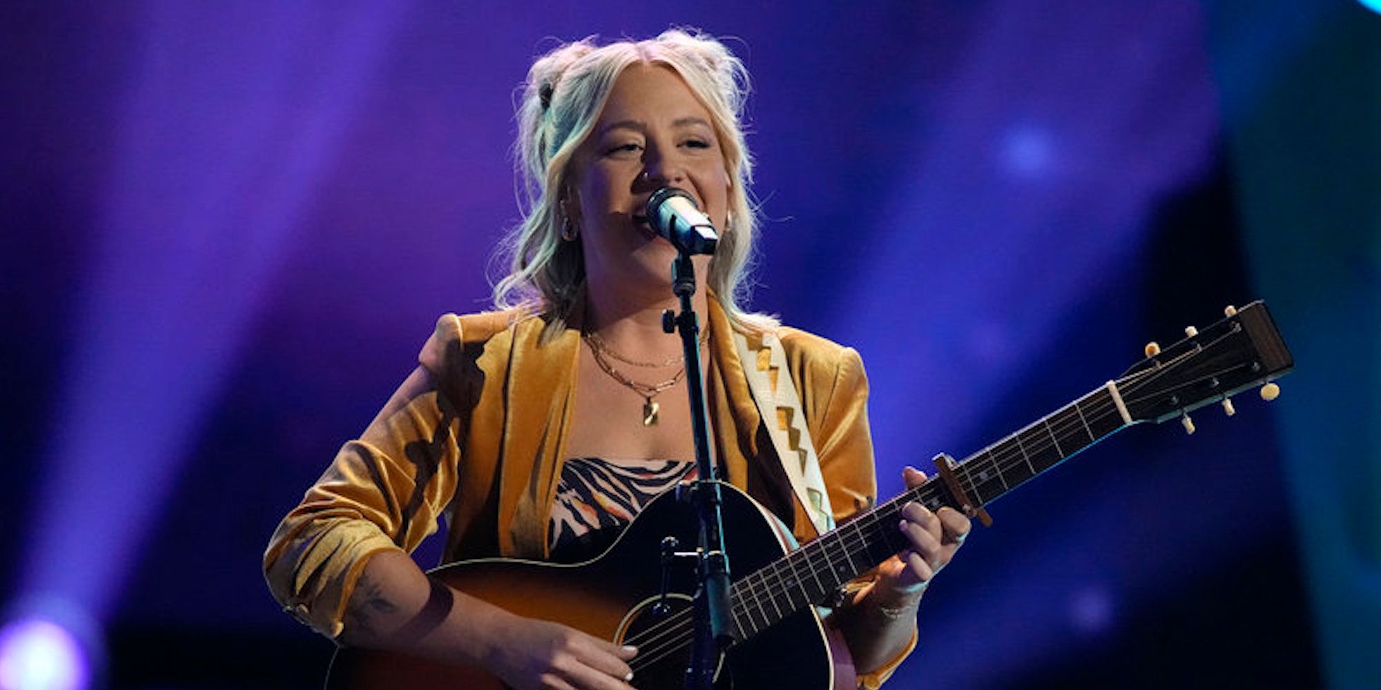 Dani Stacy performs with her guitar auditioning on 'The Voice'