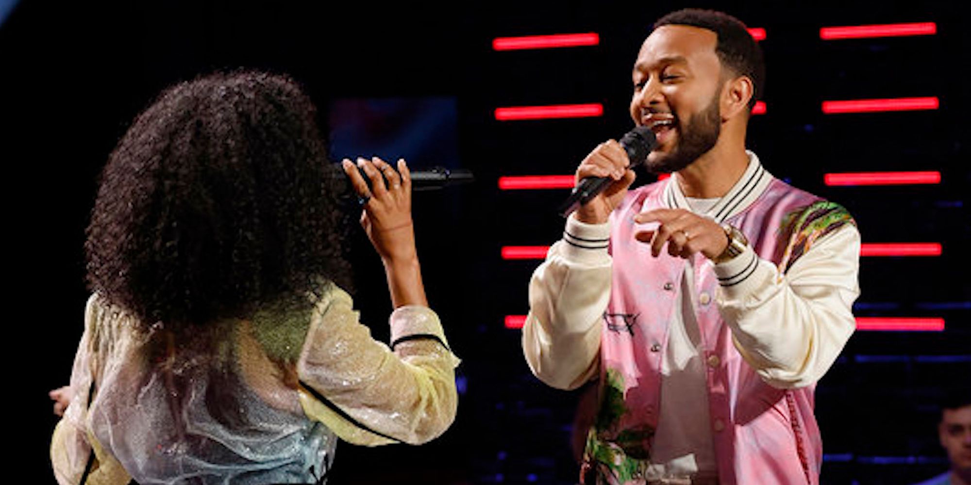 John Legend attempts to sway vocalist Nadège's choice by singing a duet with her on stage at 'The Voice'