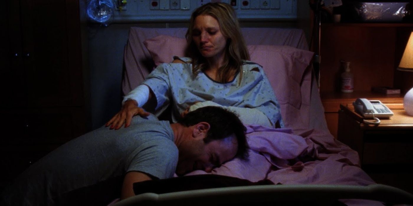 Charlotte in a hospital bed comforting Cooper in private practice