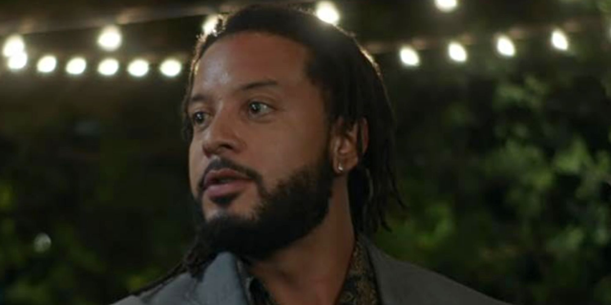 Close up of Elijah Stone (Brandon Jay McLaren) in a suit from The Rookie