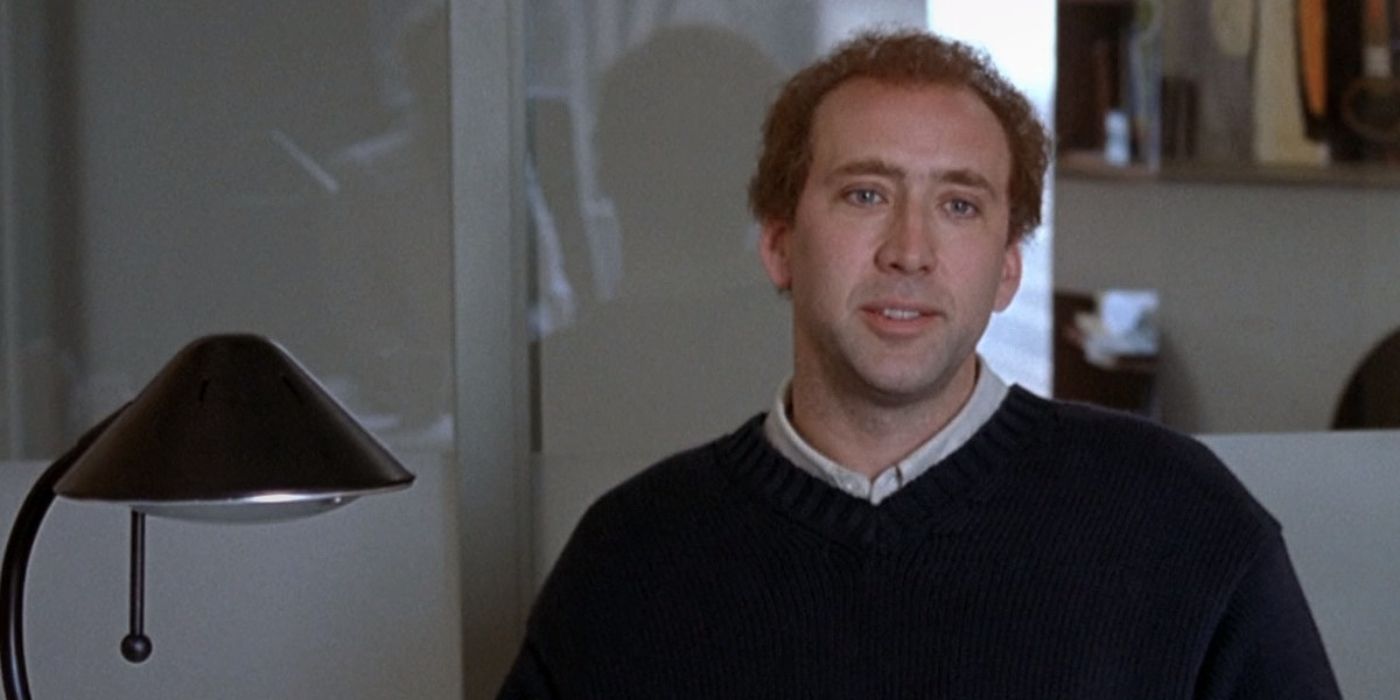 Close-up of Nicolas Cage as Charlie Kaufman smirking in adaptation