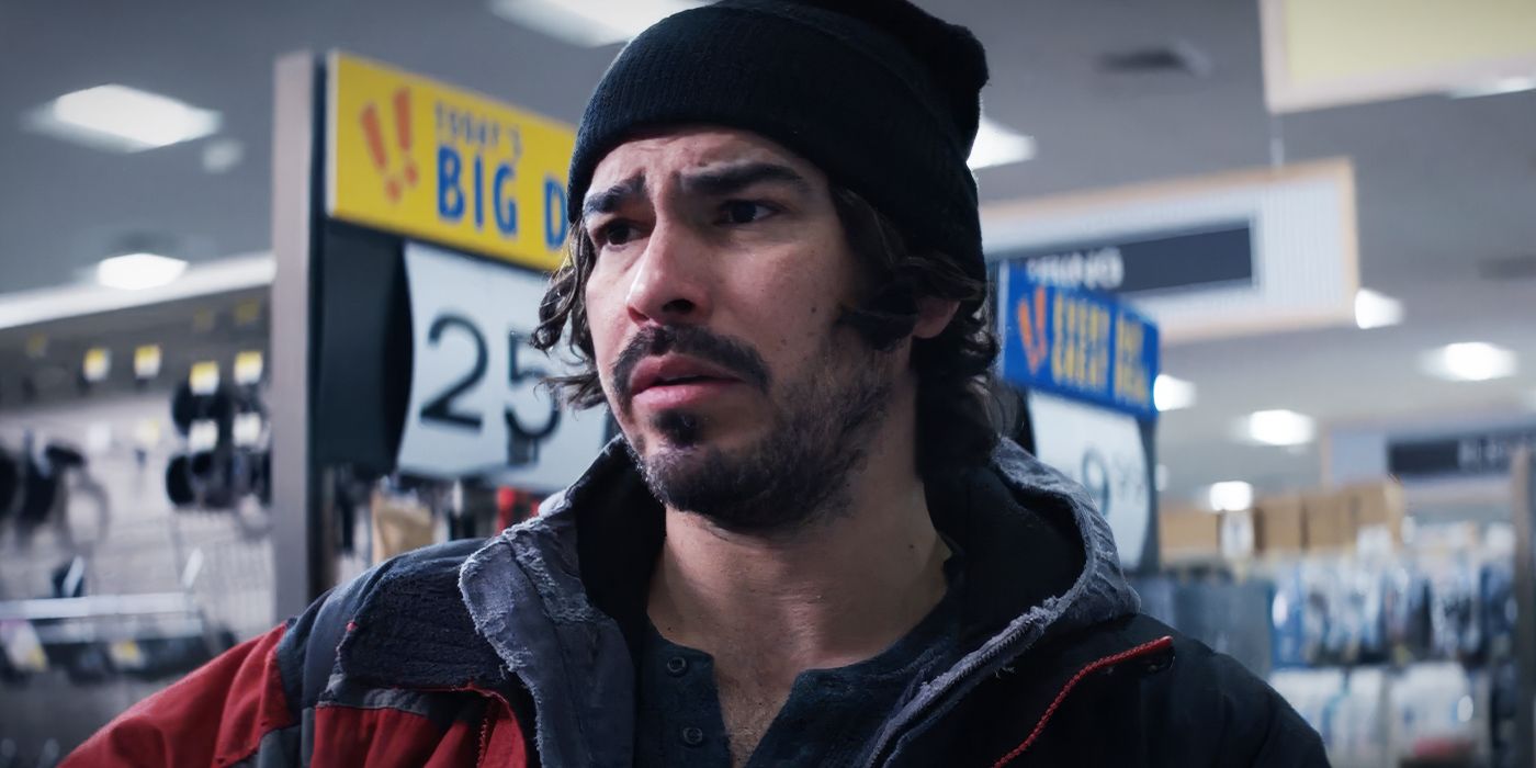 Raúl Castillo as Billy standing in a store wearing a hat in Cold Wallet.