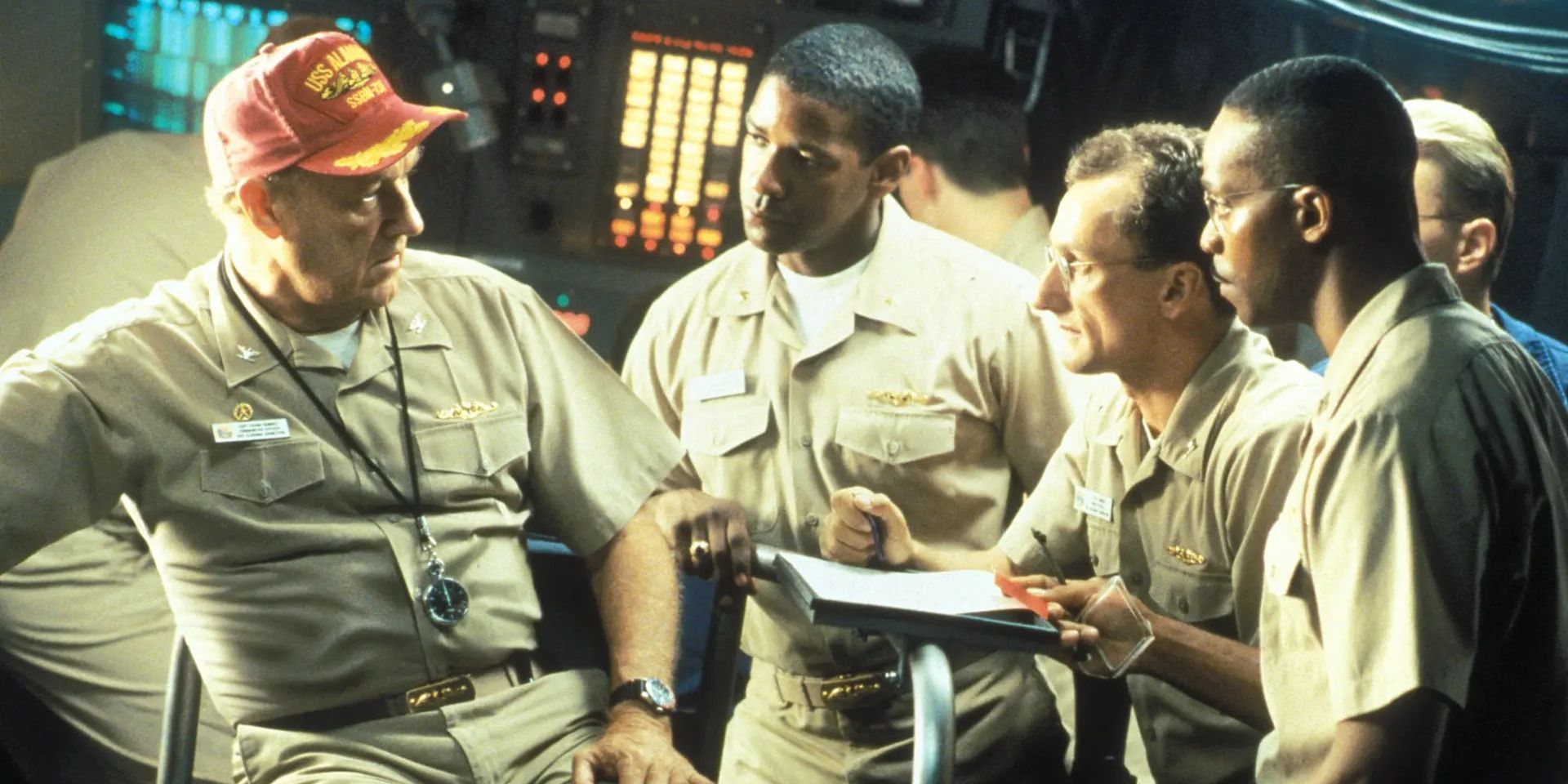 Gene Hackman and Denzel Washington go over procedures with their officers on board a submarine in Tony Scott's 'Crimson Tide'