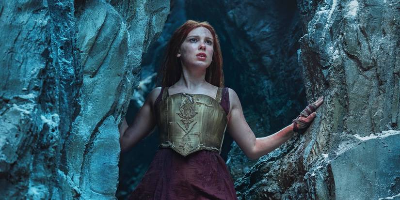 Millie Bobby Brown looking to the distance in Damsel
